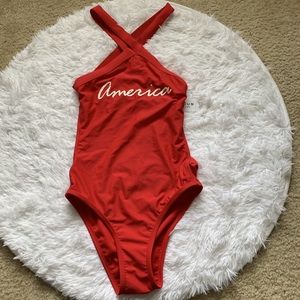 Red one piece bathing suit with back out